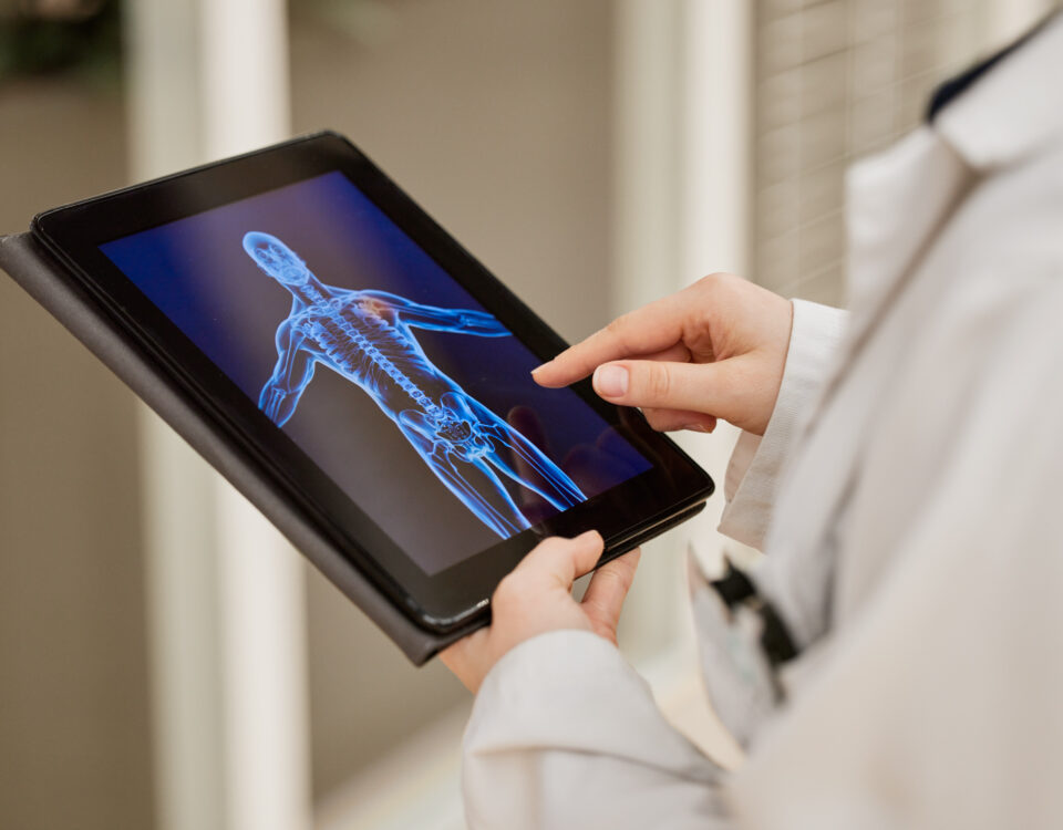 doctor hands and tablet x ray mri results and healthcare research anatomy solution and injury re