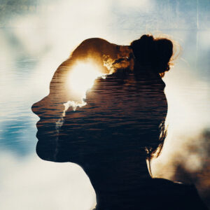 Sun in woman's head. Mindset and psychology concept.